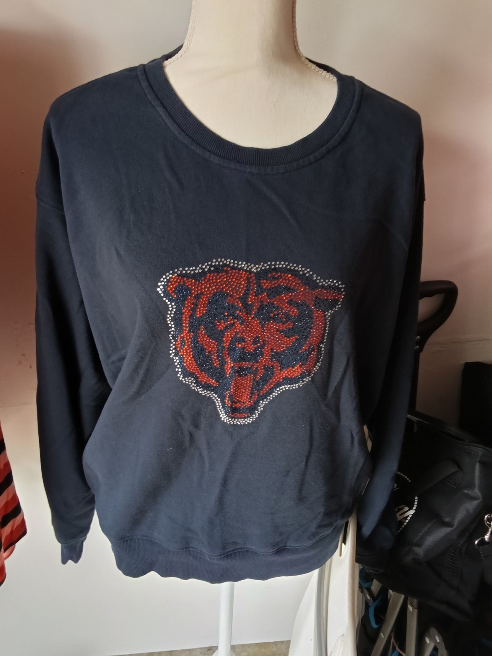 DKNY Navy Sweatshirt with Embellished Orange and Silver Bear Motif